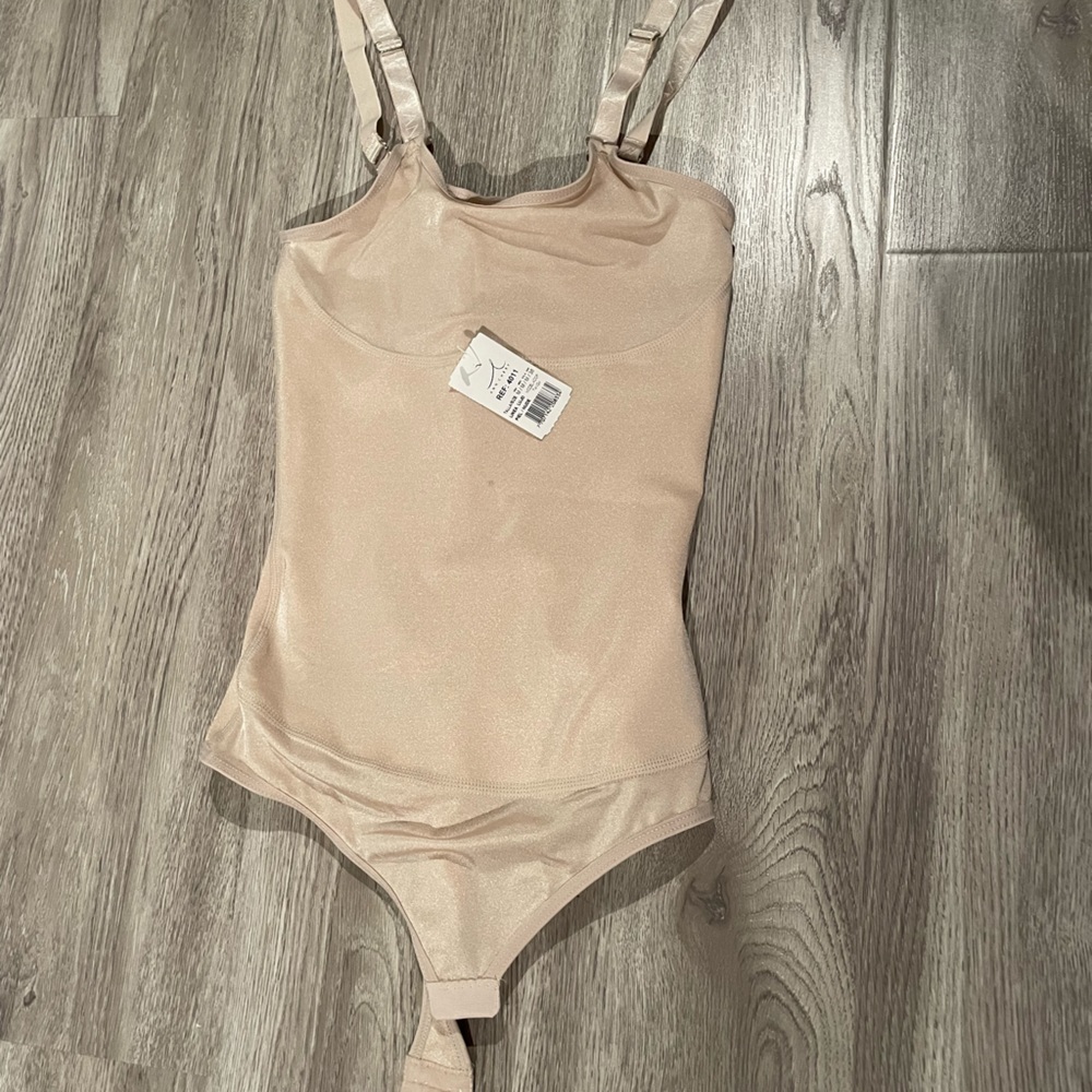 Nude tummy control body suit (I’d classify the size as xs)